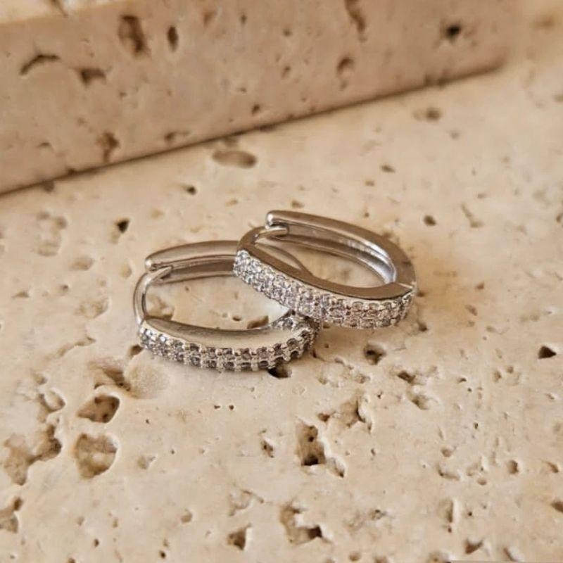 Brinco Argola Oval Cravejada