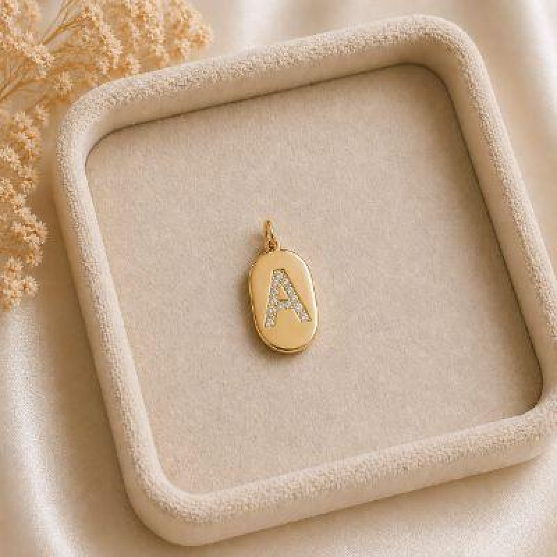 Pingente Letra Oval Cravejada A (19x10mm)