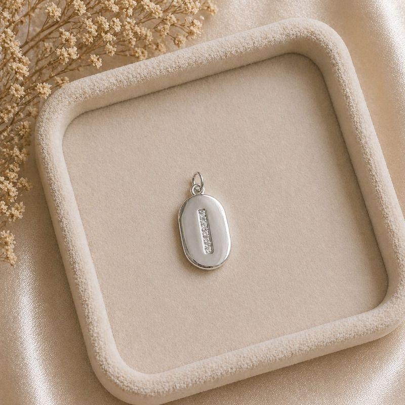 Pingente Letra Oval Cravejada I (19x10mm)