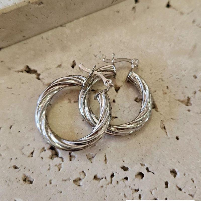 Brinco Argola Torcida Clic