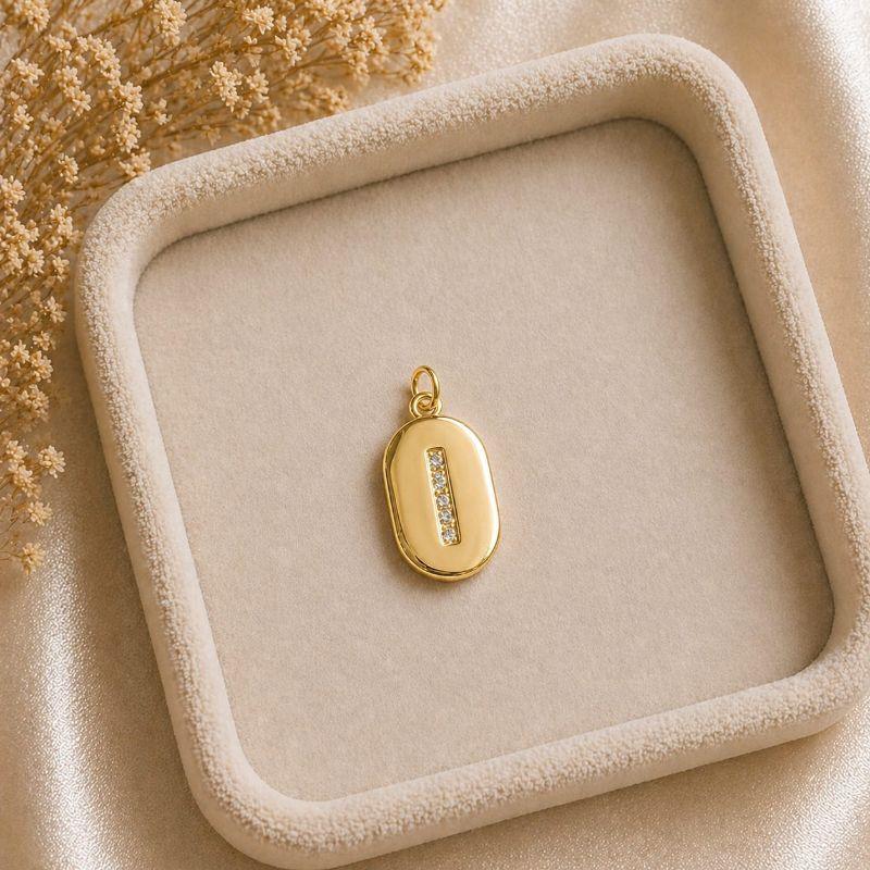 Pingente Letra Oval Cravejada I (19x10mm)